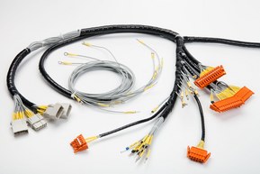 Cable harness with different connectors and end sleeves